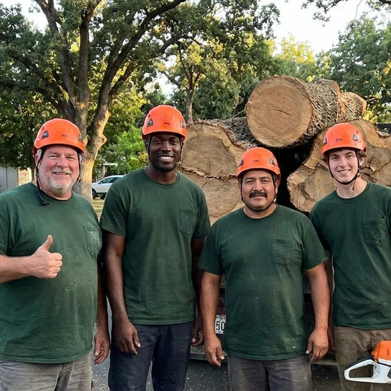 Simpson's tree crew with a truck loaded with oak logs in Virginia Beach